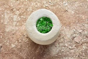 Broken glass in clay mould