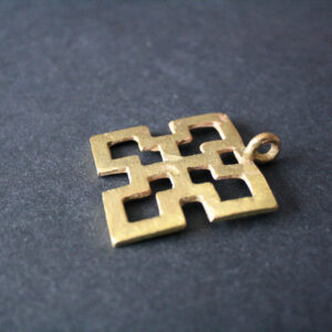 African-brass-adinkra-pendant-nsaa-symbol-of-good-quality-and-durability-side-view