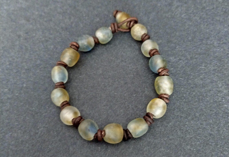 Knotted-recycled-glass-bracelet-with-African-recycled-glass-beads-golden-brown-and-soft-blue-tones-2 Knotted-recycled-glass-bracelet-with-African-recycled-glass-beads-golden-brown-and-soft-blue-tones-2