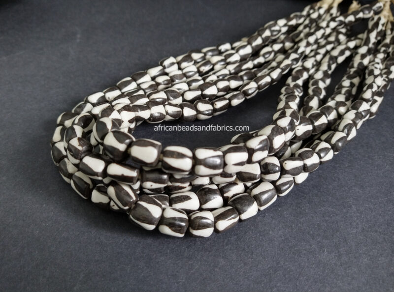 African-Beads-Kenyan-Bone-Medium-tubes-10-to-12-mm-batiked-cream-and-black-triangles