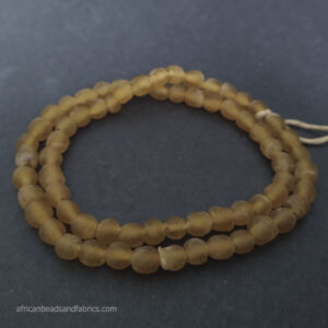 African beads Krobo Recycled Glass 7mm round pale golden brown African beads Krobo Recycled Glass 7mm round pale golden brown