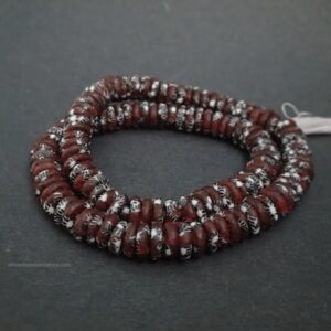 African Refashioned Glass doughnut beads dark red African Refashioned Glass doughnut beads dark red